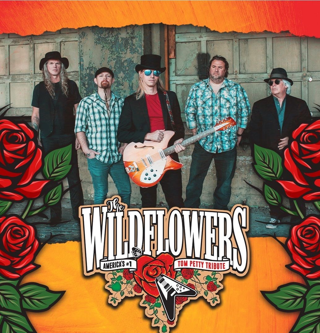 Concert poster for The Wildflowers, a Tom Petty tribute band, performing at Saloon Studios Live in West Jefferson, NC, on August 8, 2026. The image features the band members with classic guitars against a rustic, Old West saloon backdrop, including event details and the Saloon Studios logo.